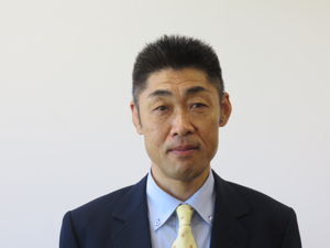 会長 石嶋勝比古